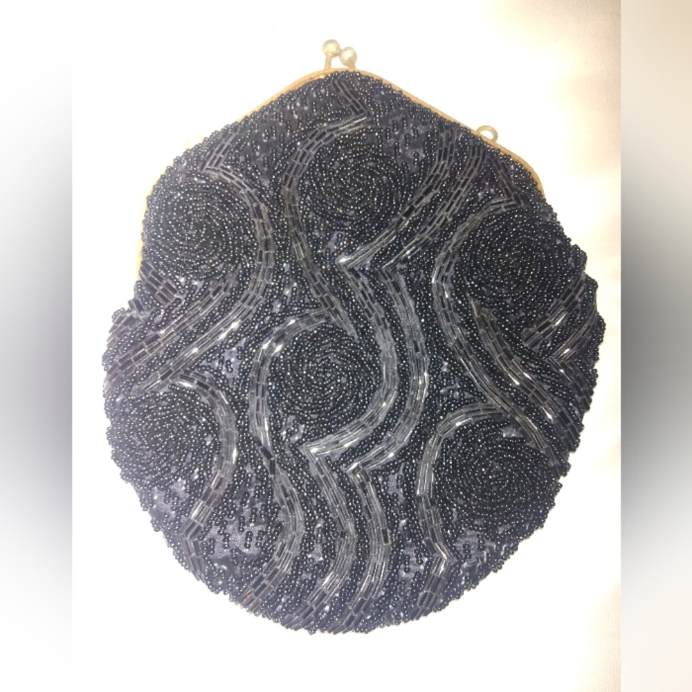 Antique hand beaded black and gold clutch